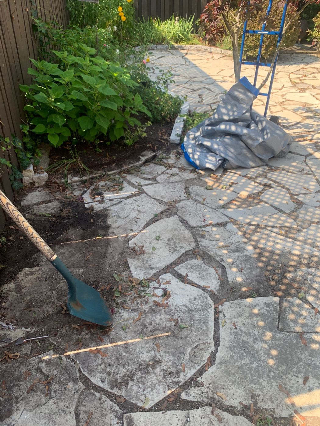 razorshap landscaping project: Flagstone patio clear